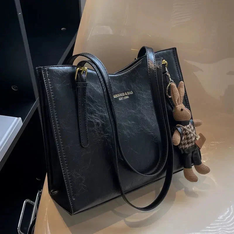NIKKI™ - Elegante Schultertasche