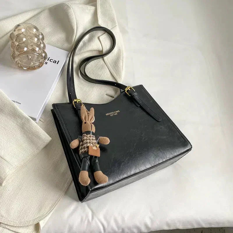 NIKKI™ - Elegante Schultertasche