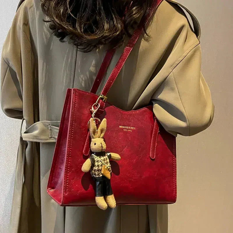 NIKKI™ - Elegante Schultertasche